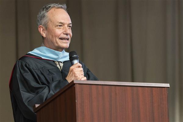 Chip Rowan speaks to the graduates.